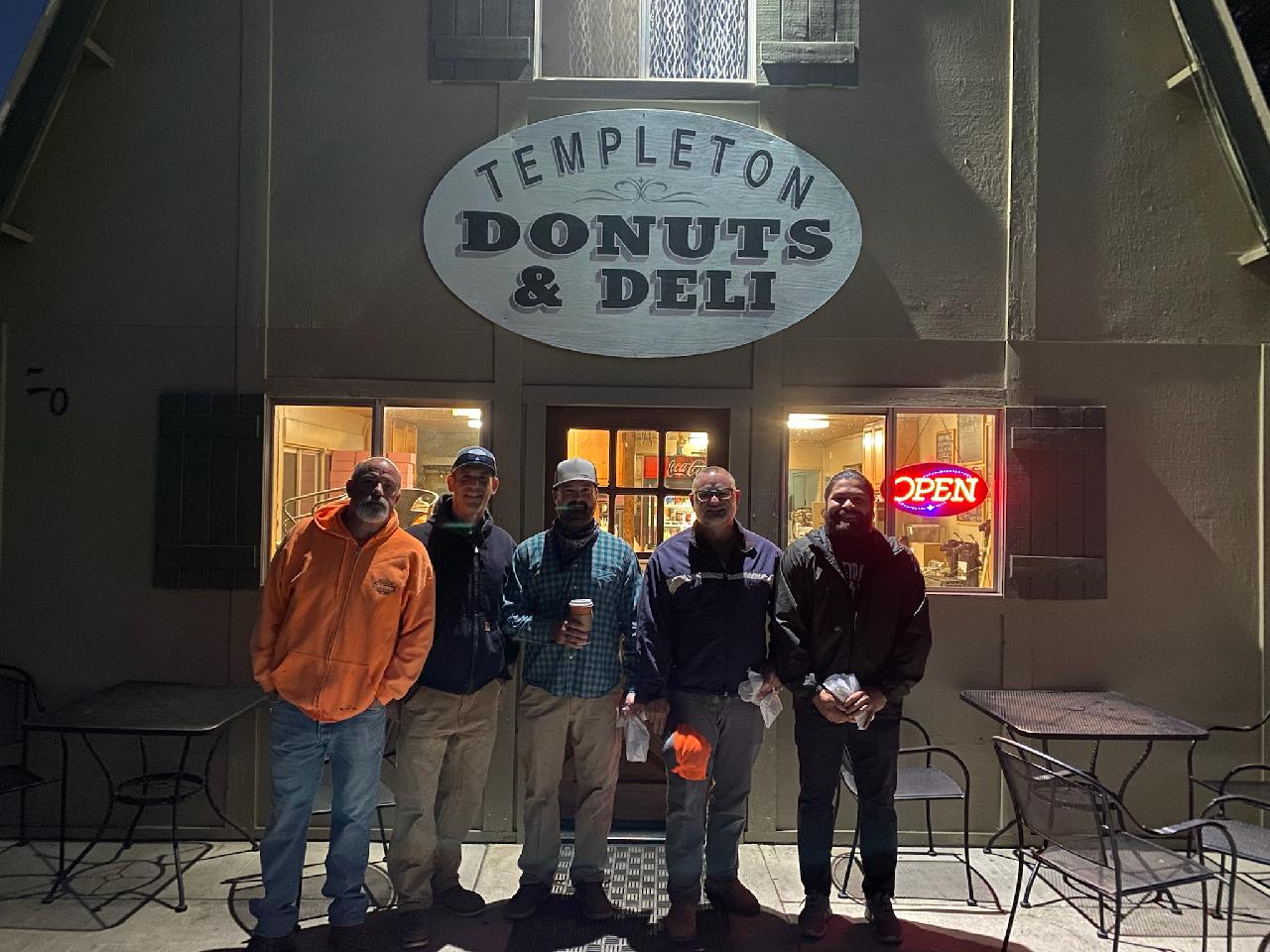 Caltrans surveyors outside donut shop