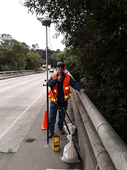 Joe Morris working in Cambria on GPS on Benchmarks