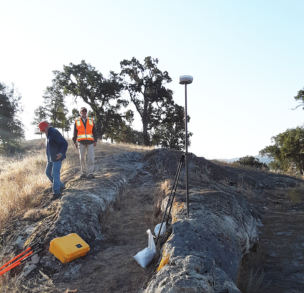 Leonard and Doug working on a hard set up in Santa Margarita for GPS on Benchmarks